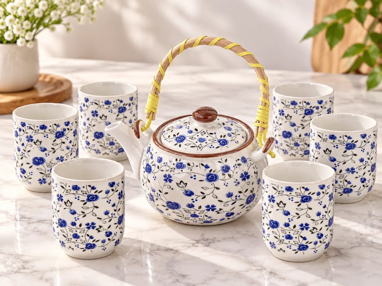 7-piece white tea set with blue floral patterns